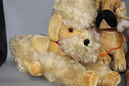 A group of assorted soft toys including teddy bears and soft toy pigs including Steiff